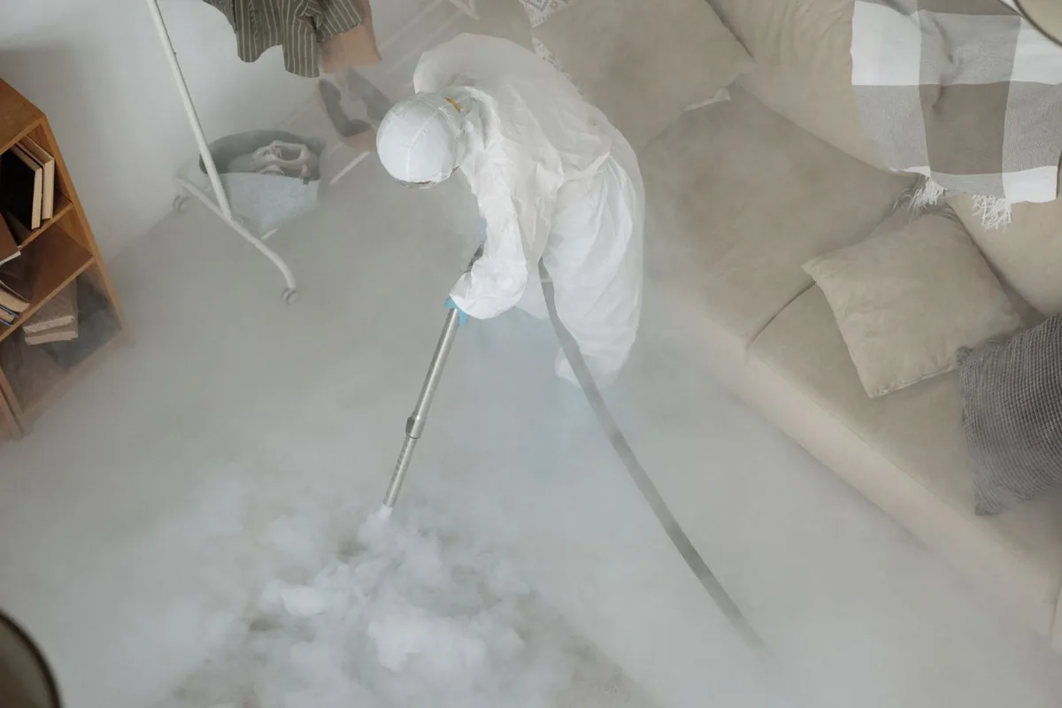 Biohazard cleanup technician in protective equipment, East Canton, OH
